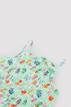 Bañador bebé niña detalle volante y nido de abeja estampado fauna marina