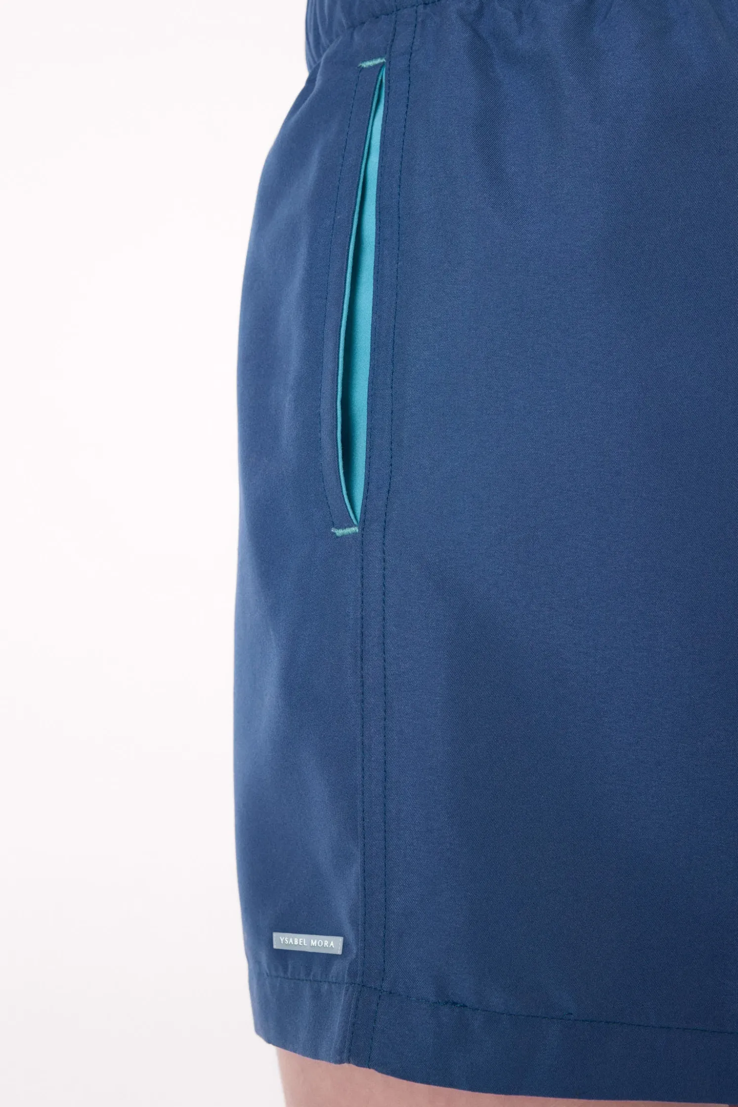 Bañador juvenil corto estampado liso azul