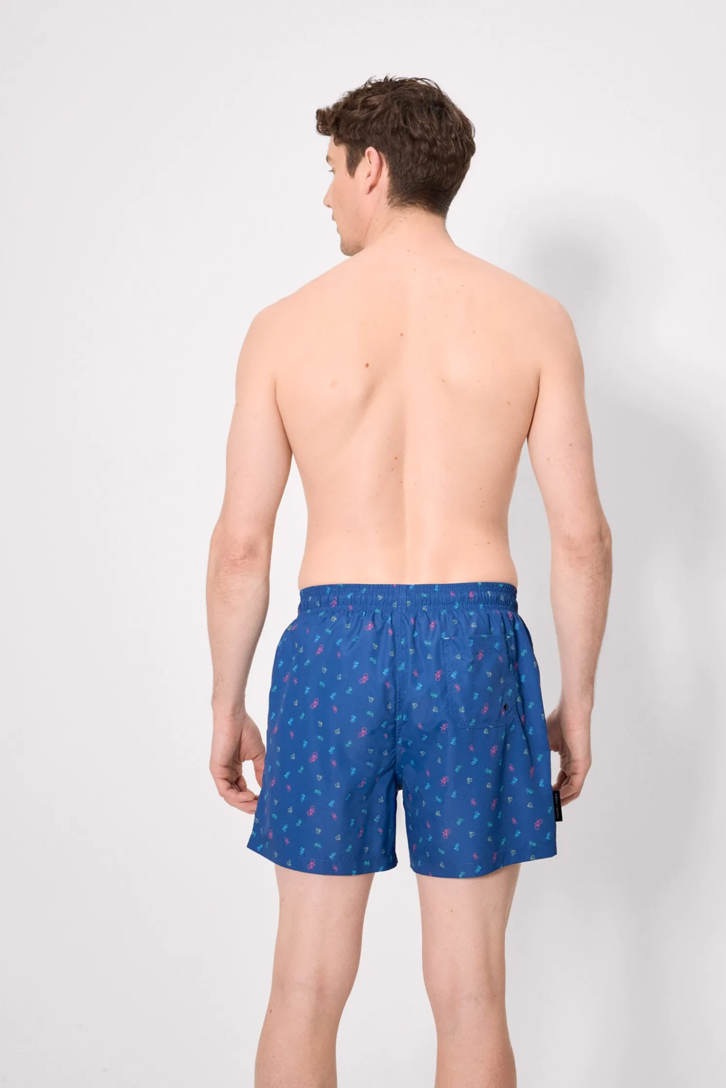 Bañador medio estampado bicicletas azul