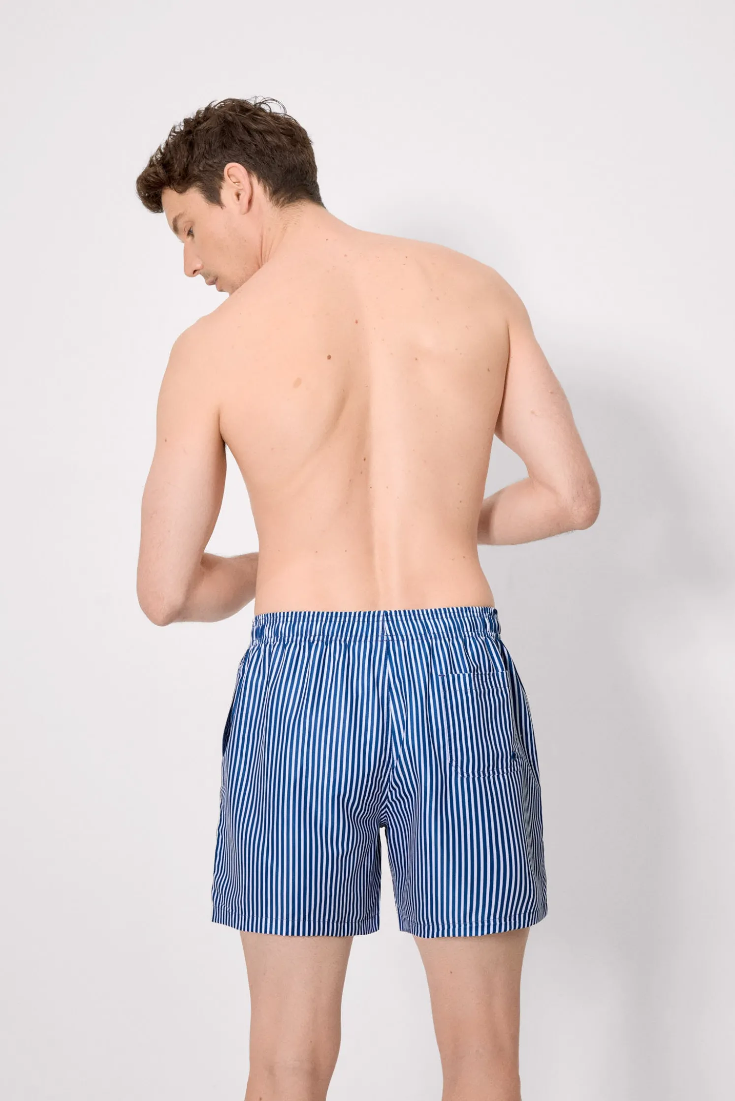 Bañador medio estampado rayas azul