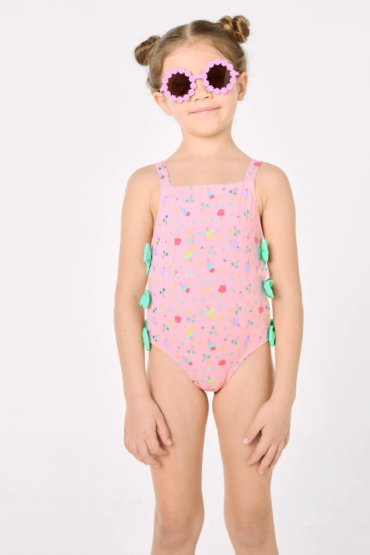 Bañador niña detalle cut-out y lazos estampado veraniego rosa