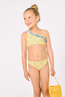 Bikini niña asimétrico detalle volantes estampado tortugas amarillo