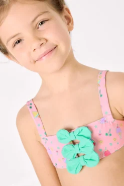 Bikini niña detalles lazos estampado veraniego helados