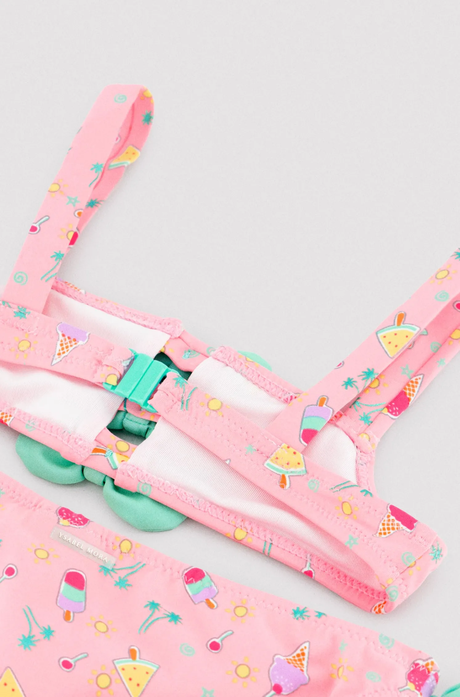 Bikini niña detalles lazos estampado veraniego helados