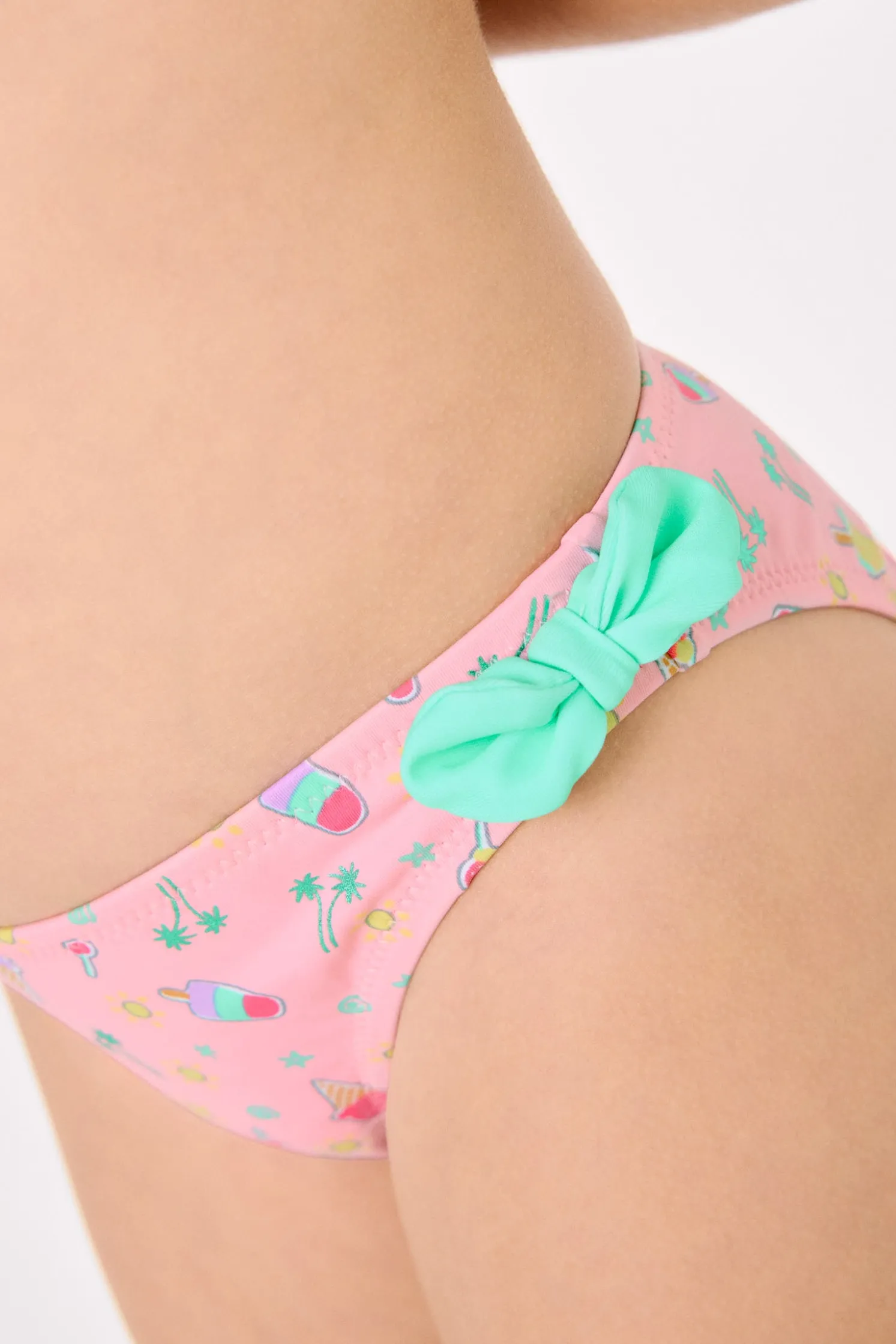 Bikini niña detalles lazos estampado veraniego helados