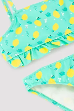 Bikini niña detalle volante estampado limones
