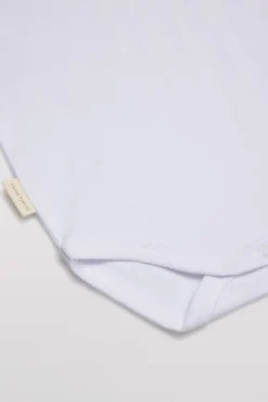 Body bebé básico manga corta solapas blanco