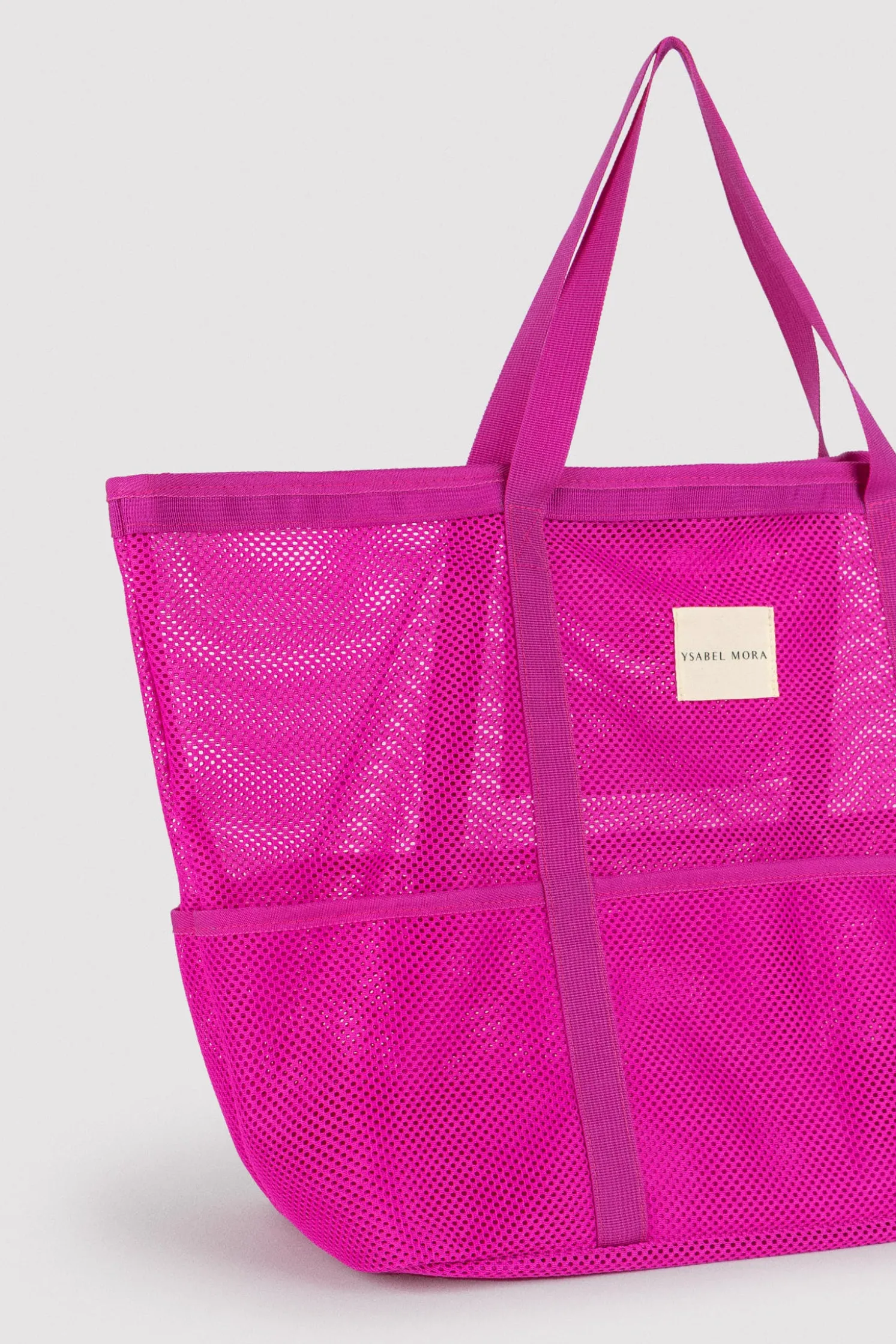 Bolso de playa calado rosa