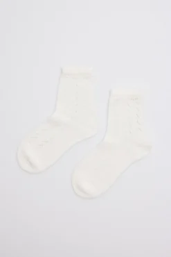 Calcetines calados infantil marfil