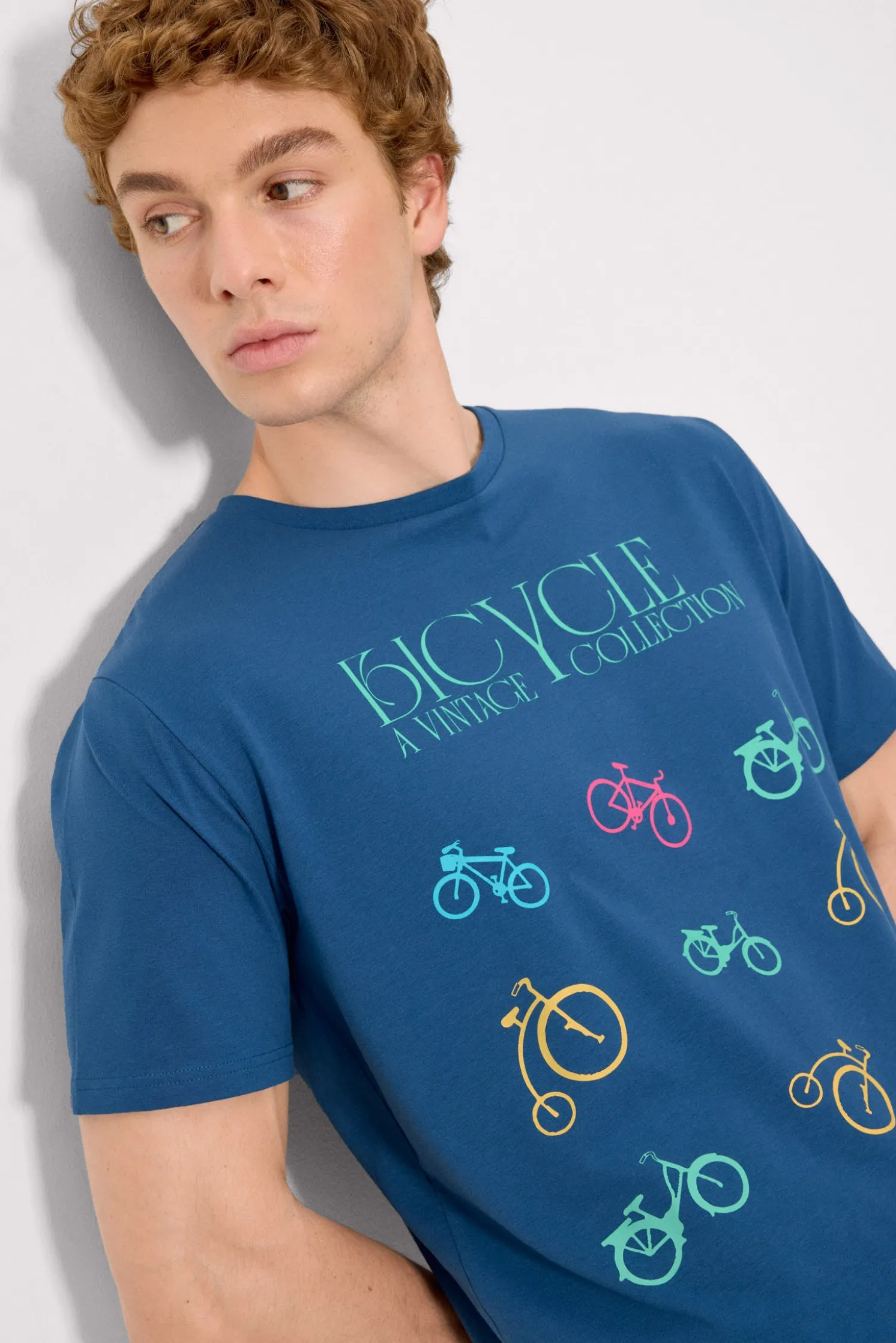Camiseta manga corta estampado bicicletas azul