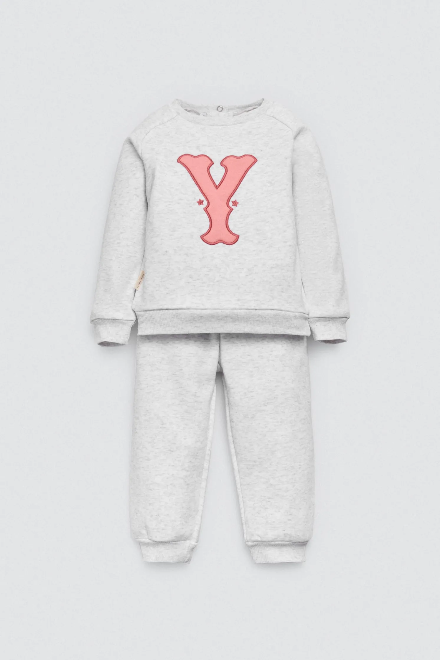 Conjunto bebé sudadera y jogger gris estampado