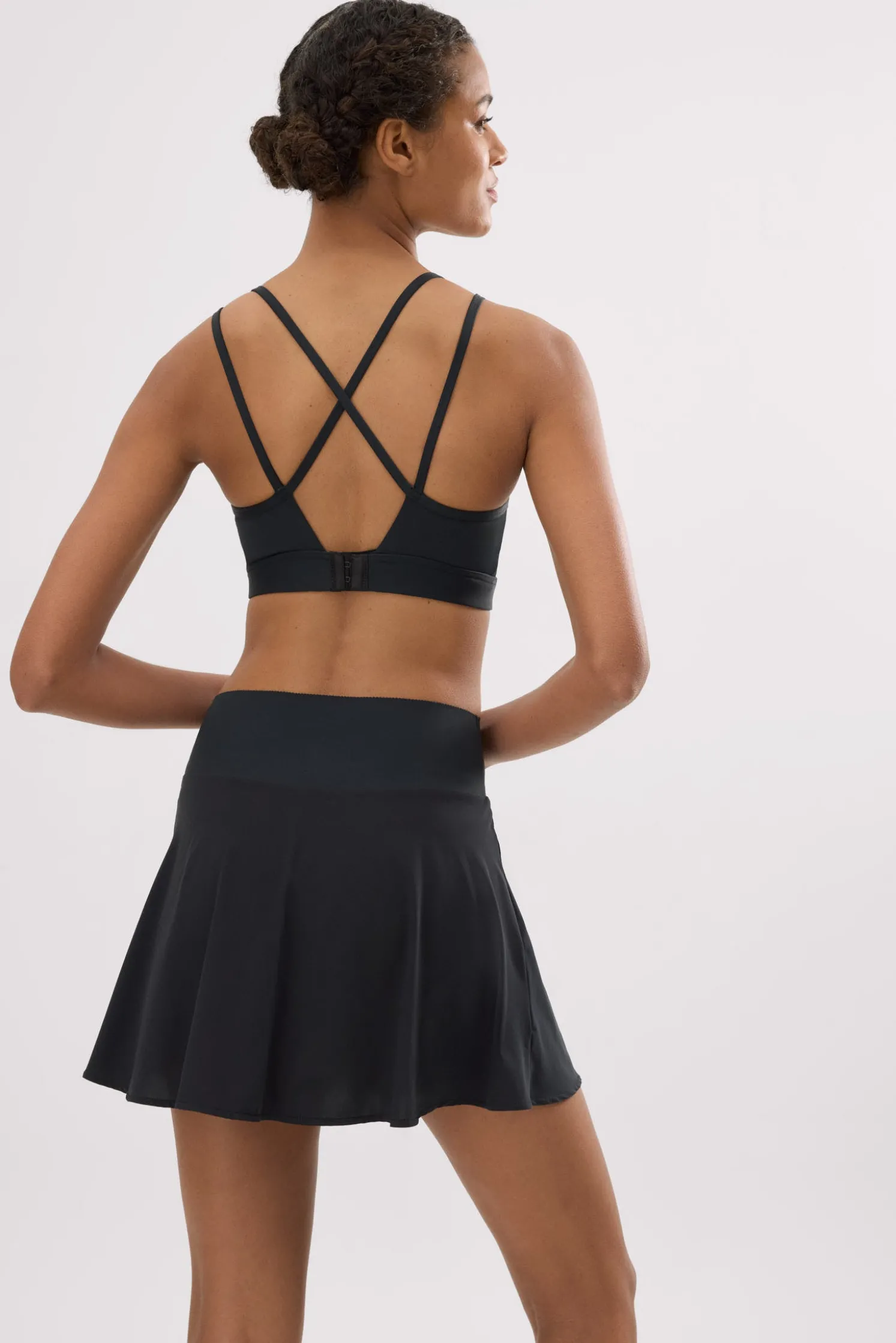 Falda deportiva Compressive con short y bolsillo interior negra