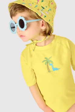 Gorro de playa bebé ala recta estampado dinosaurios amarillo