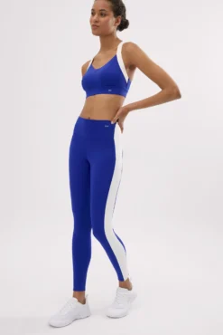 Leggings deportivos largos efecto push-up azul con franja en contraste