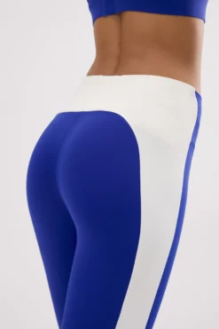 Leggings deportivos largos efecto push-up azul con franja en contraste