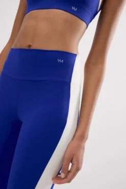 Leggings deportivos largos efecto push-up azul con franja en contraste