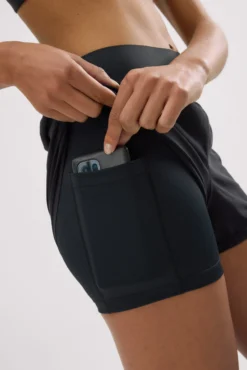 Pantalones deportivos cortos Compressive con short y bolsillo interior