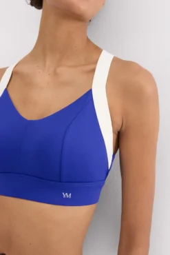 Sujetador deportivo contorno ajustable blanco y azul eléctrico