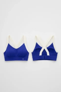 Sujetador deportivo contorno ajustable blanco y azul eléctrico