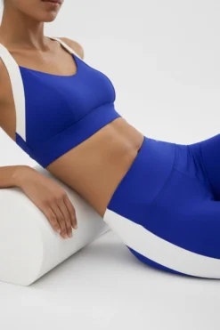 Sujetador deportivo contorno ajustable blanco y azul eléctrico