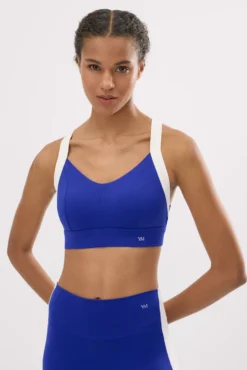 Sujetador deportivo contorno ajustable blanco y azul eléctrico