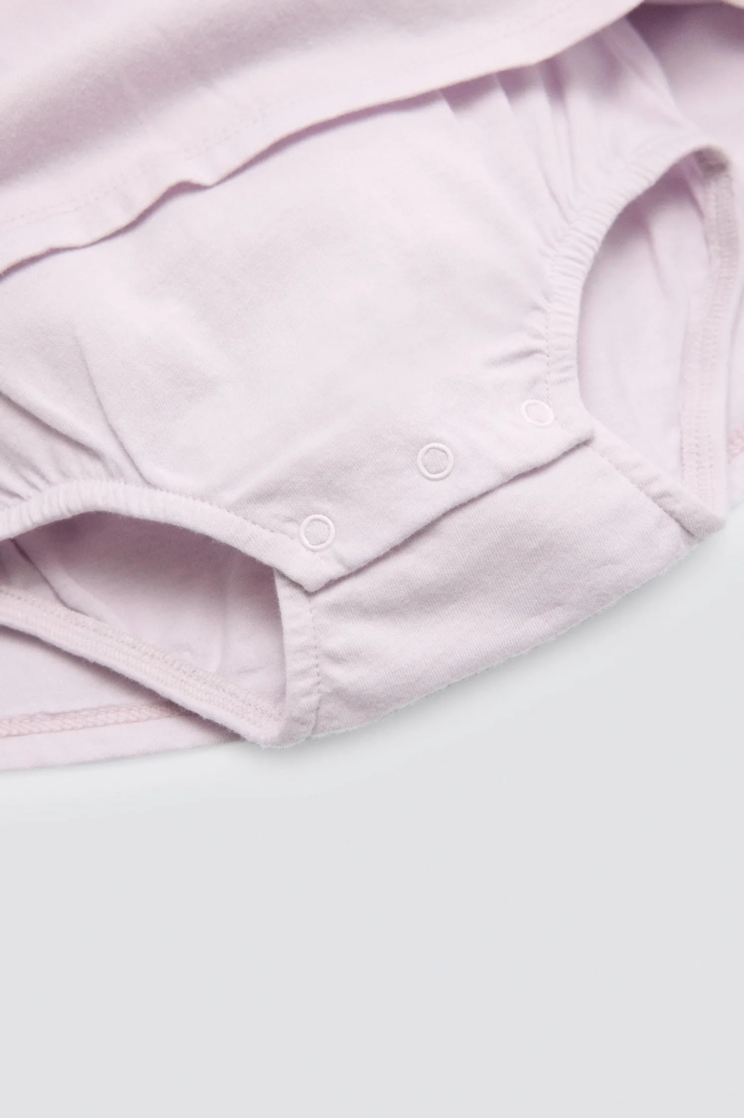 Vestido body bebé sin mangas detalles volantes